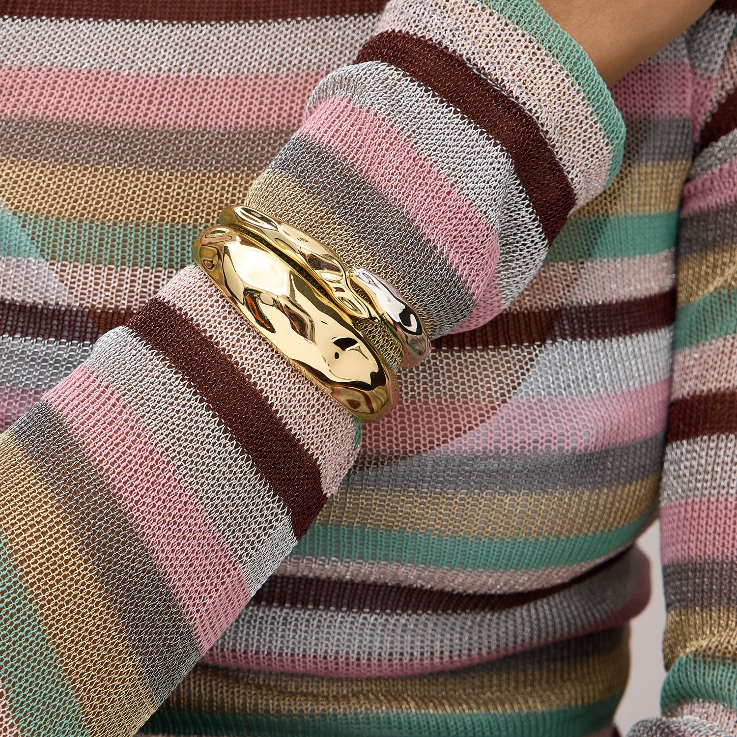 Gold and Silver Cuff Bracelet Styled on Model with Chunky Gold Cuff