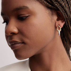 Gold and Silver Drop Earrings on Model