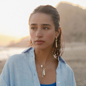 Gold and Silver Fish Drop Earrings Styled on Model