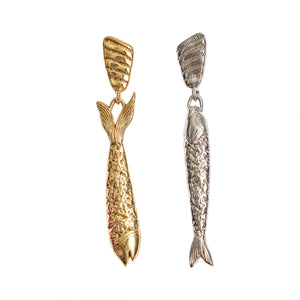 Gold and Silver Fish Drop Earrings on Flat White Background