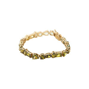 Green Crystal Tennis Bracelet on Flat White Background