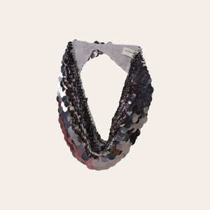 Gunmetal Sequin Mini Scarf Necklace on Grey Background