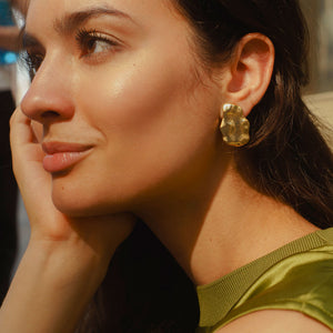 Hammered Gold Organic Stud Earrings Styled on Model