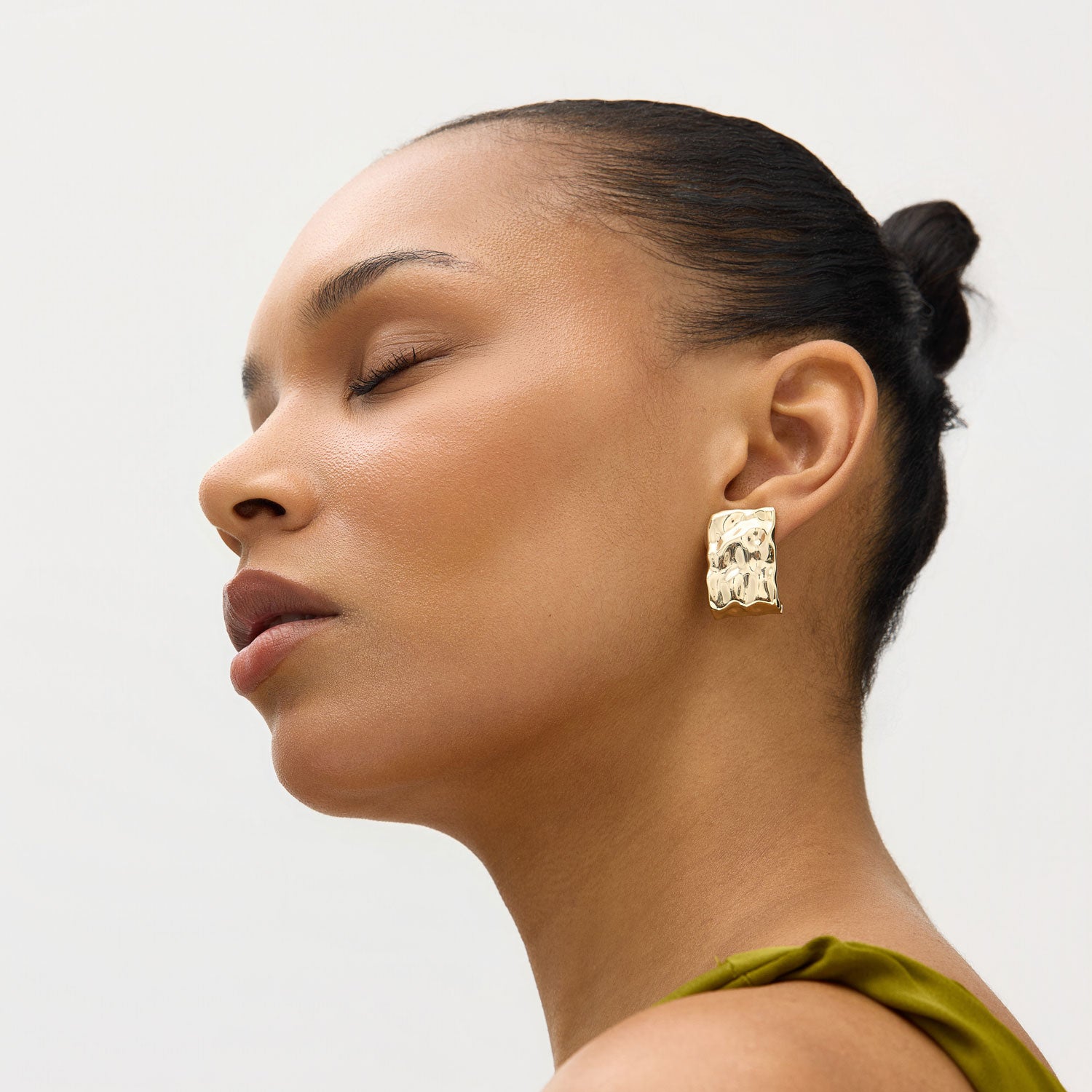 Hammered Gold Stud Earrings Styled on Model