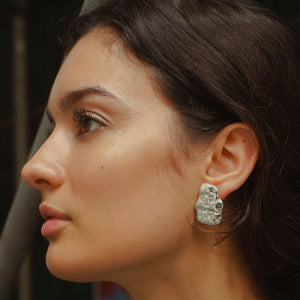 Silver Organic Shaped Stud Earrings On Model