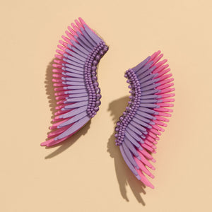 Purple and Pink Sequin and Bead Wing Earrings on Flat Tan Background
