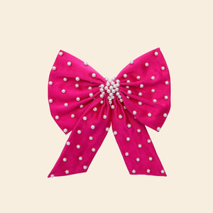 Hot Pink Silk and Pearl Embroidered Hair Bow on Tan Background