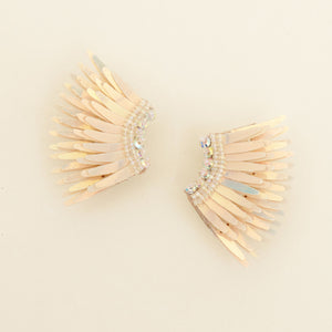 Peach Wing Stud Earrings on Cream Background