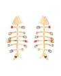 Fossil shaped gold earrings with stones on the sides on white background