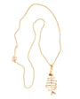 Gold necklace with a unique pendant on a white background