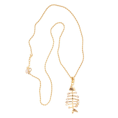 Gold necklace with a unique pendant on a white background