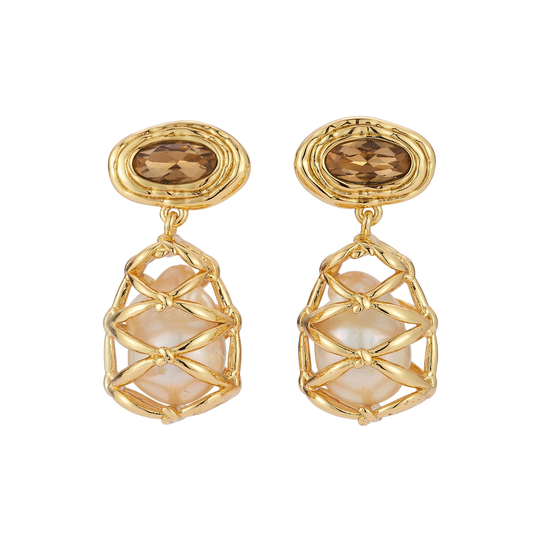 Gold earrings with gemstones and pearls on a white background