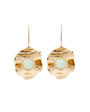Gold earrings with light green gemstones on a white background