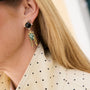 Cicada Inspired Black, Green and gold dangle earrings on Mignonne Gavigan Closeup