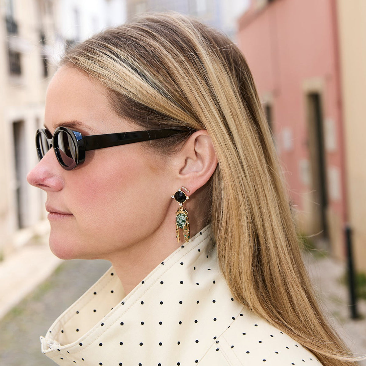 Cicada Inspired Black, Green and gold dangle earrings on Mignonne Gavigan Lifestyle 