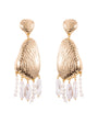 Gold earrings with pearl drops on a white background