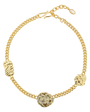 Gold chain bracelet with textured links on a white background