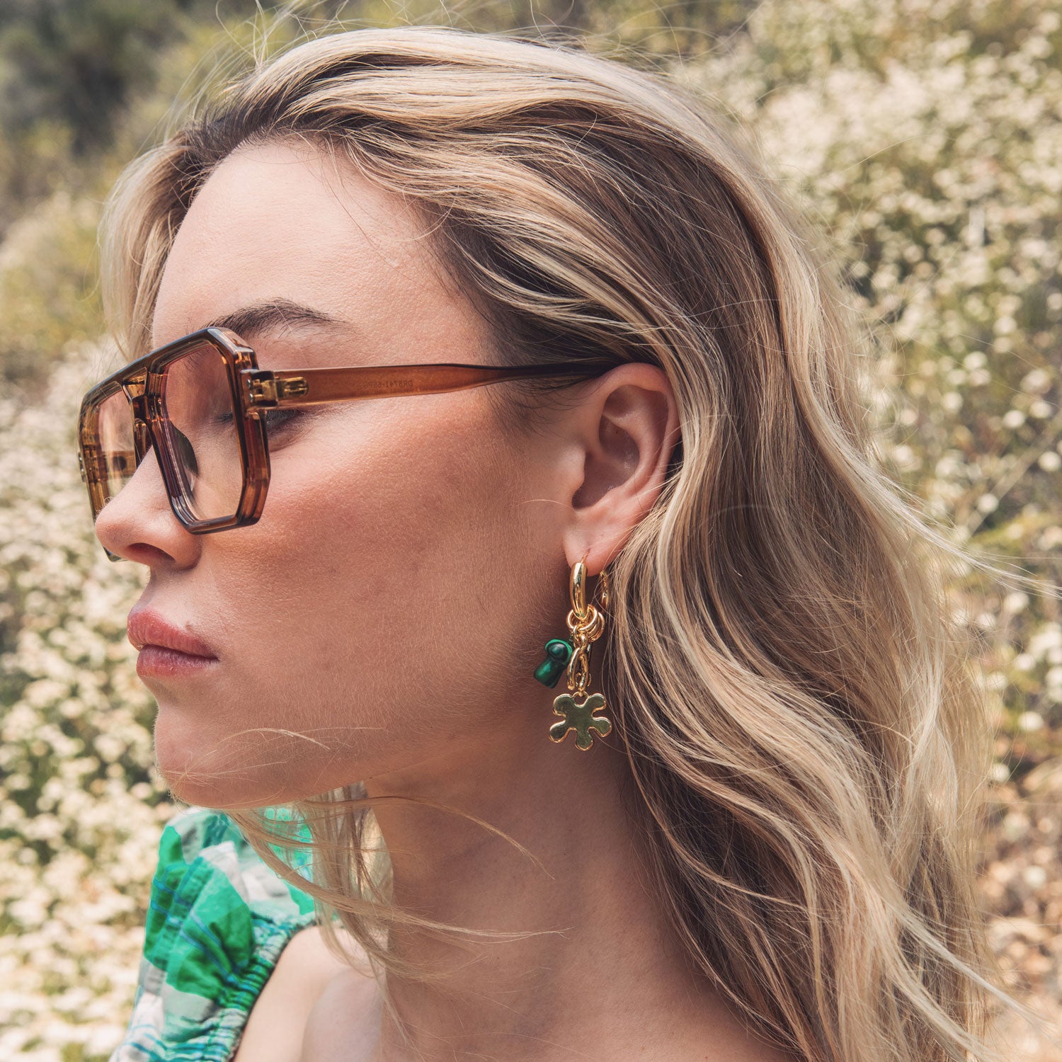 Green Stone and Gold Flower Hoop Drop Earrings Styled on Model