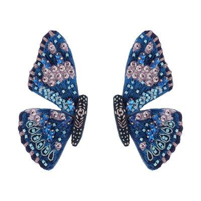 Pair of blue butterfly earrings with intricate beadwork on a white background
