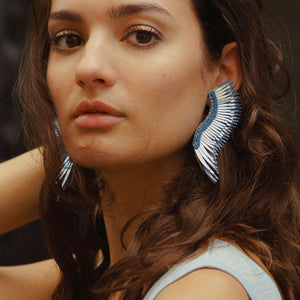 Blue Sequin Wing Stud Earrings Styled on Model