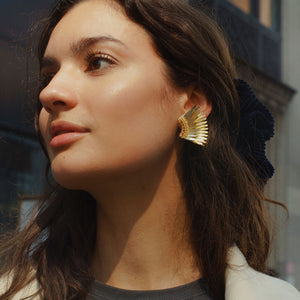 Metallic Gold Sequin Wing Stud Earrings on Model