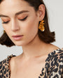 Metallic Gold Wavy Sequins on Thin Gold Hoop on Brunette Model with Cheetah Print Blouse