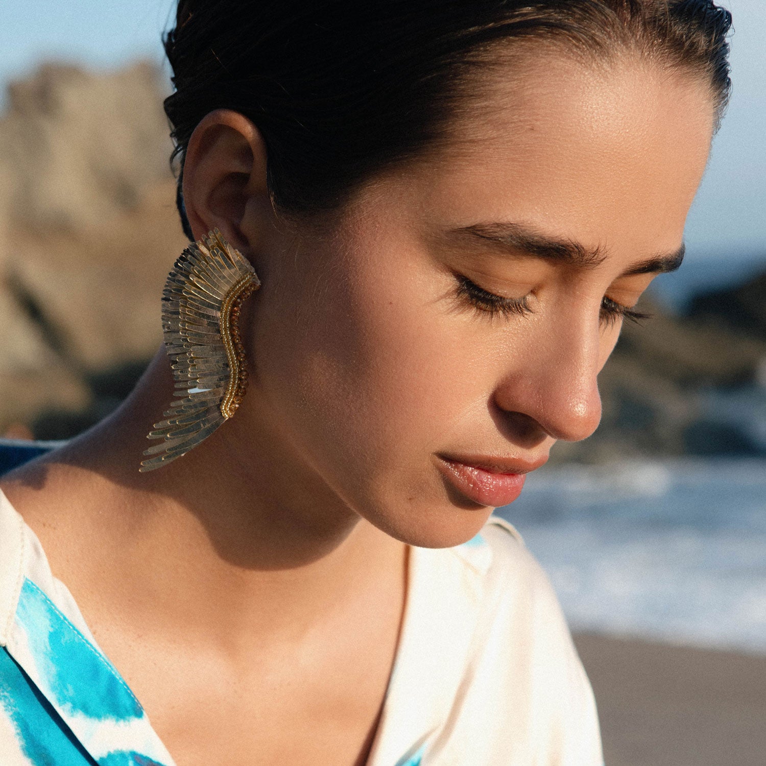 Gold Sequin Wing Stud Earrings Styled on Model