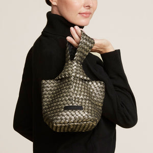 Gold and Black Woven Neoprene Bag Styled on Model in Black Sweater and Jeans