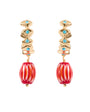 Gold hoop with blue stones and red and orange stone dropping on white background