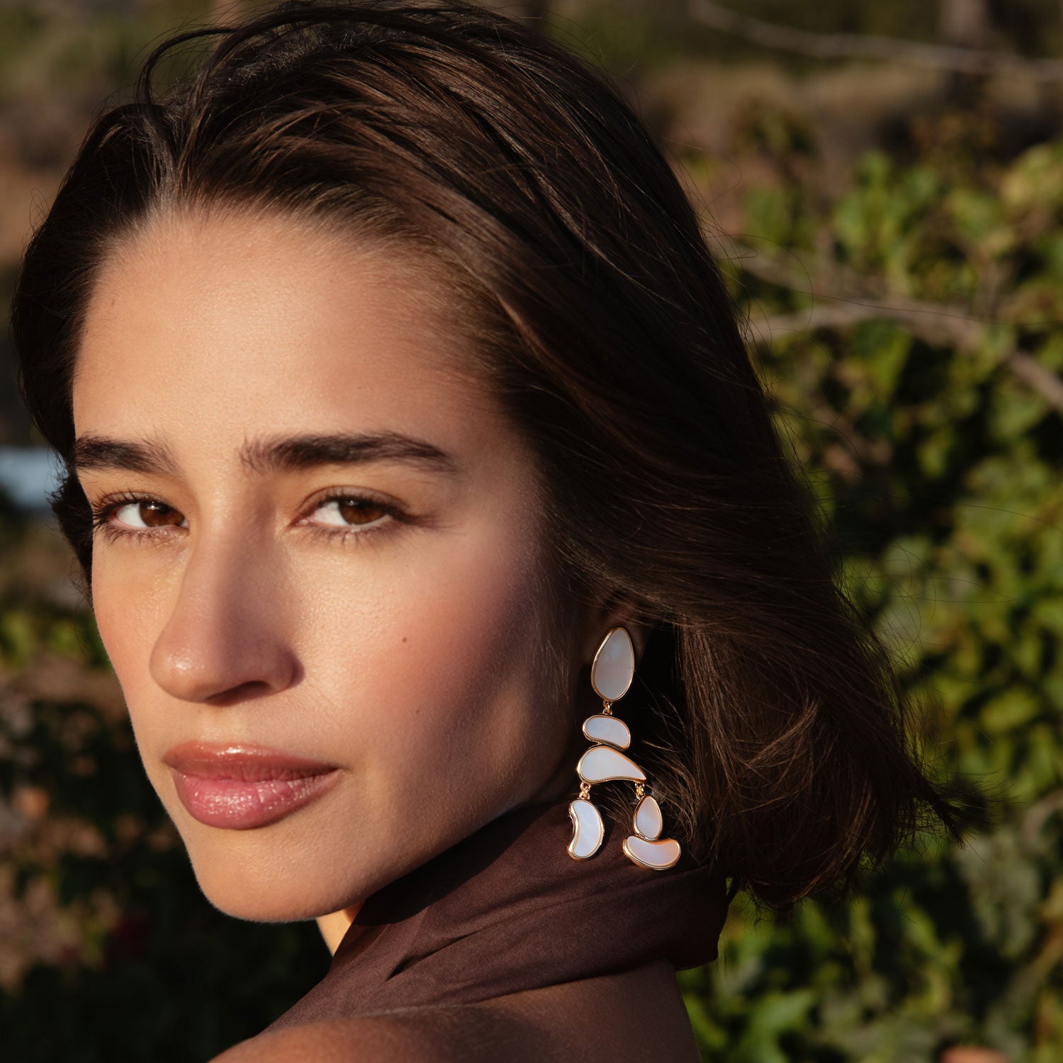 Mother of Pearl and Gold Drop Earrings Styled on Model