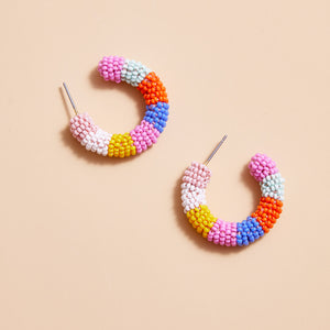 Multi-Colored Beaded Hoops on Tan Background