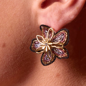 Metallic Threaded Gold Flower Studs Styled on Model's Ear