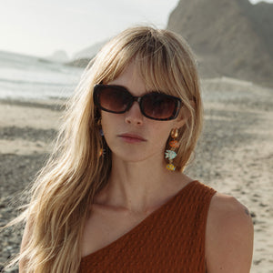 Painted Fish Drop Earrings Styled on Model