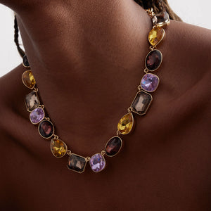 Purple, Yellow, Red, Brown Crystal Necklace on Gold Chain Styled on Model's Neck