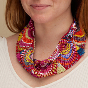 Multi-Colored Sequin Embroidered Mini Scarf Necklace Styled on Model in White Top