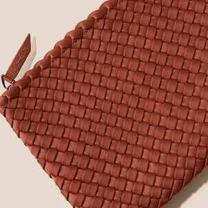 Brown Woven Insert Pouch on Cream Surface