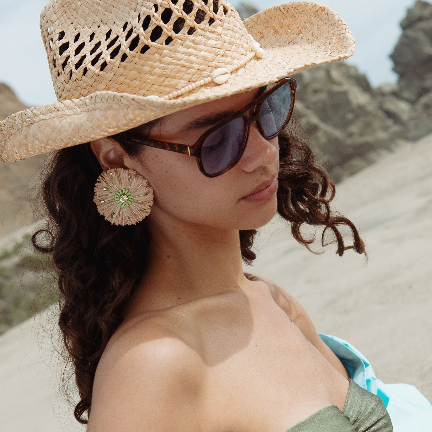Raffia and Green Beaded Oversized Stud Earrings Styled on Model