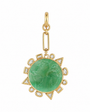 A gold pendant featuring a round green jadeite carnelian centerpiece surrounded by a decorative gold frame with small clear stones, shown on a plain white background.