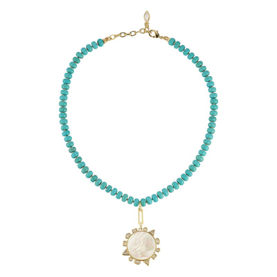 Turquoise beaded necklace with a gold pendant on a white background