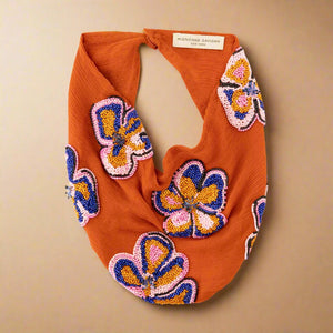 Orange Scarf Necklace with Orange, Pink, and Blue Beaded Flower Embroidery on Tan Background