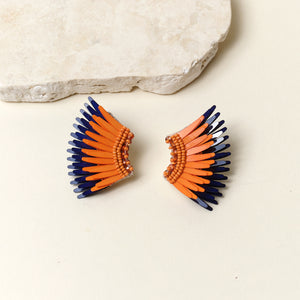 Orange and Navy Sequin and Bead Wing Stud Earrings on Tan Background