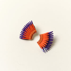 Purple and Orange Sequin and Bead Wing Stud Earrings on Tan Background