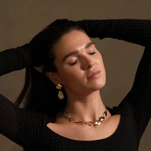 Hammered Gold Chain Necklace Styled on Model with Gold and Pearl Drop Earrings