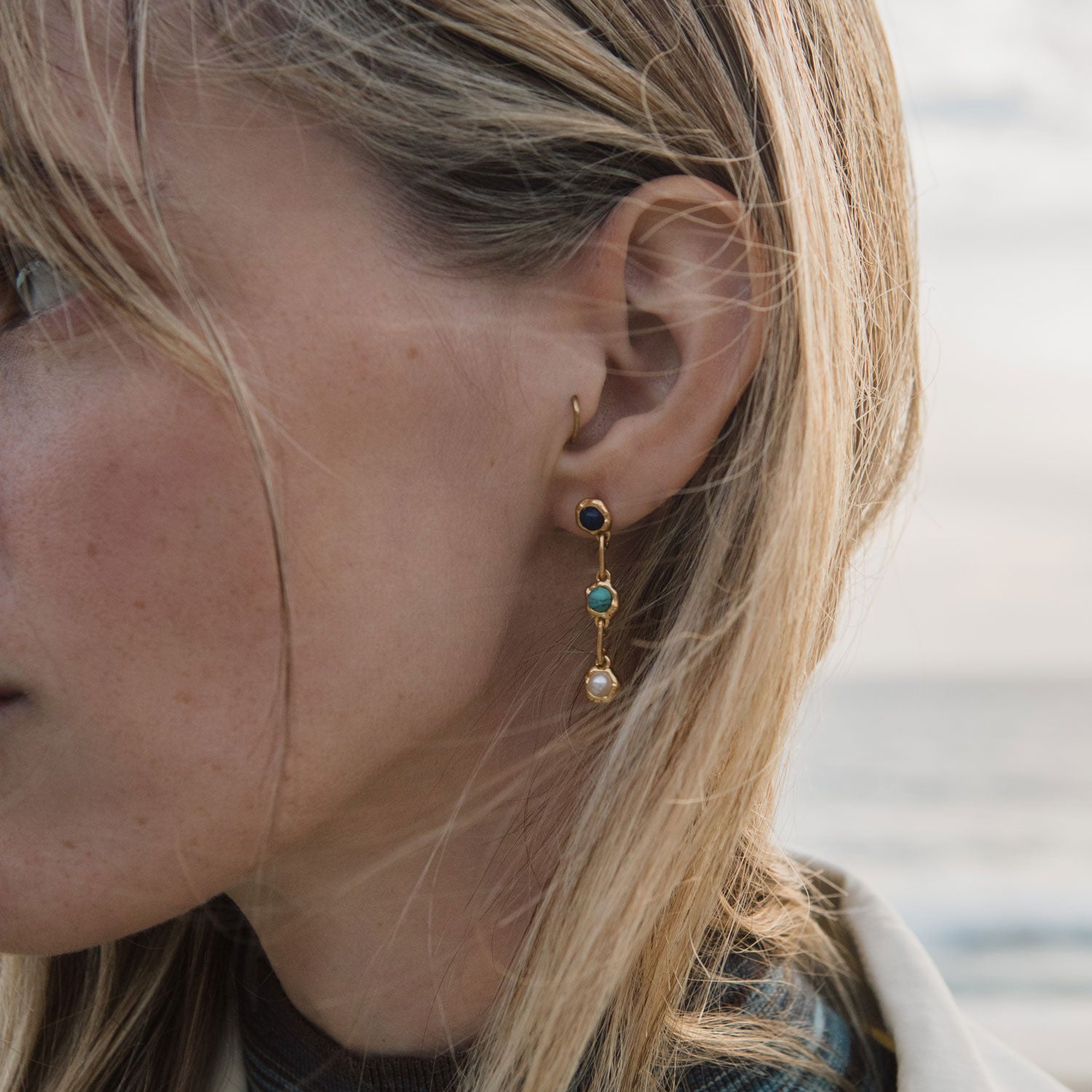 Stone and Pearl Gold Drop Earrings Styled on Model