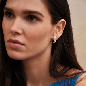 Gold and Crystal Stud Earrings Styled on Model