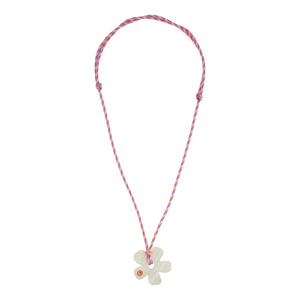 Pink Cord and White Flower Pendant Necklace on Flat White Background