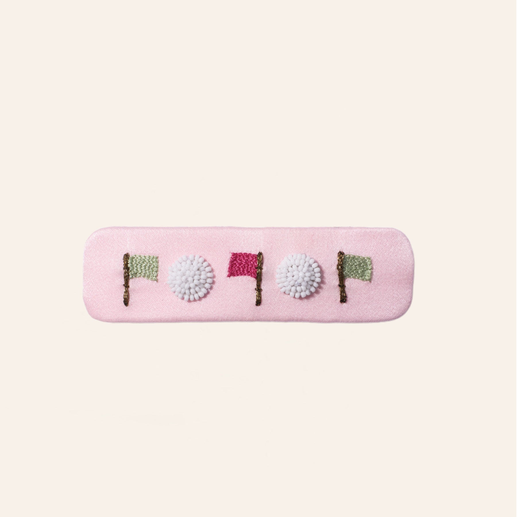 Pink Hair Clip with Golf Flags and Golf Balls Embroidery on Tan Background