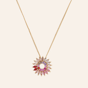Pink Crystal Pendant Necklace on Tan Background