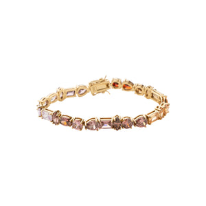 Pink, Orange, Red, and Purple Crystal Tennis Bracelet on Flat White Background