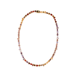 Red, Purple, and Yellow Crystal Tennis Necklace on Flat White Background